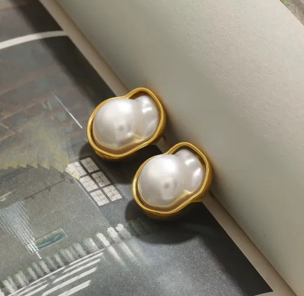 Golden_Stainless_Steel_And_Hypoallergenic_Coating_Earrings_For_Women